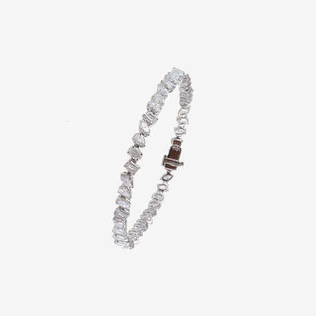 Bracelet Rivière Fancy Cut en or blanc serti de diamants – Maison Paillard