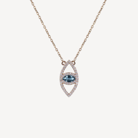 Collier Le Protecteur Topaze Bleue en or rose serti de diamants, émeraudes et topazes, collection Veronika Loubry x Paillard – Maison Paillard