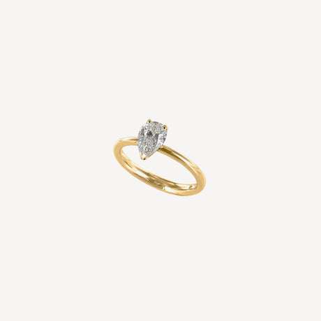 Solitaire Poire 1ct en or jaune serti de diamants – Maison Paillard