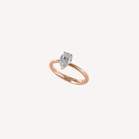 Solitaire Poire 1ct en or rose serti de diamants – Maison Paillard